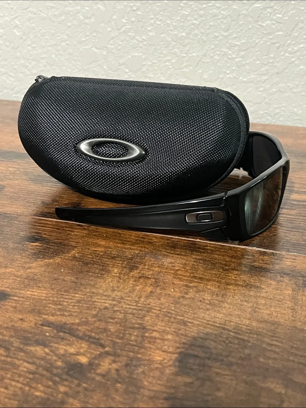 Oakley Black Sunglasses with Dark Lenses